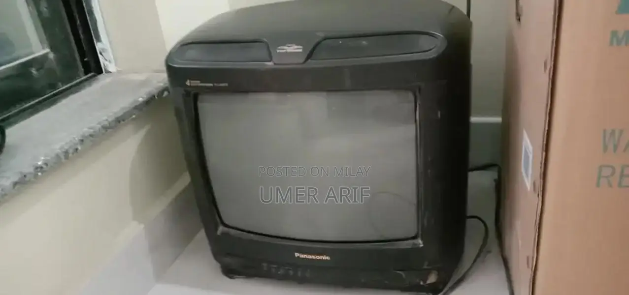 Vintage Panasonic 14-Inch Television with Original Remote Control