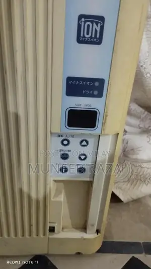 Photo - Compact Portable Japanese Air Conditioner with Instant Cooling