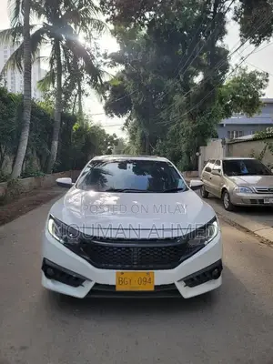 Photo - 2016 Honda Civic UG Sedan - Well-Maintained Compact Car