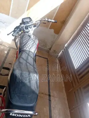 Photo - Honda CD 70 Motorcycle - Classic Commuter Bike