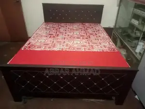 Photo - Bed Frame with Mattress - Comfortable Sleep Solution