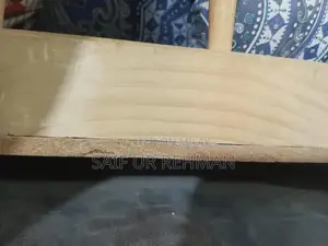 Photo - Wooden Baby Cot with Stainless Steel Frame and Foam Mattress