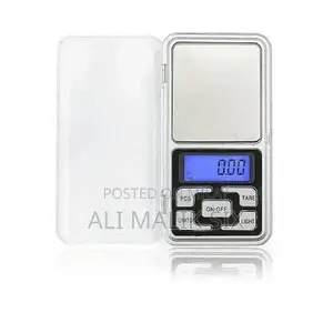 Photo - Compact Digital Pocket Scale for Precise Small Item Weighing