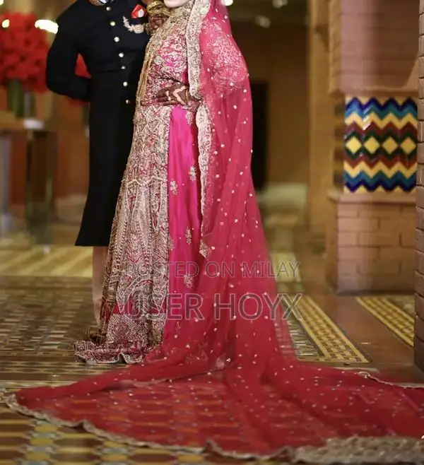 Elegant Bridal Lehenga with Intricate Hand Embroidery and Long Dupatta