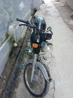 Photo - Honda 70T Motorcycle - 2021 Model Low Mileage Commuter Bike