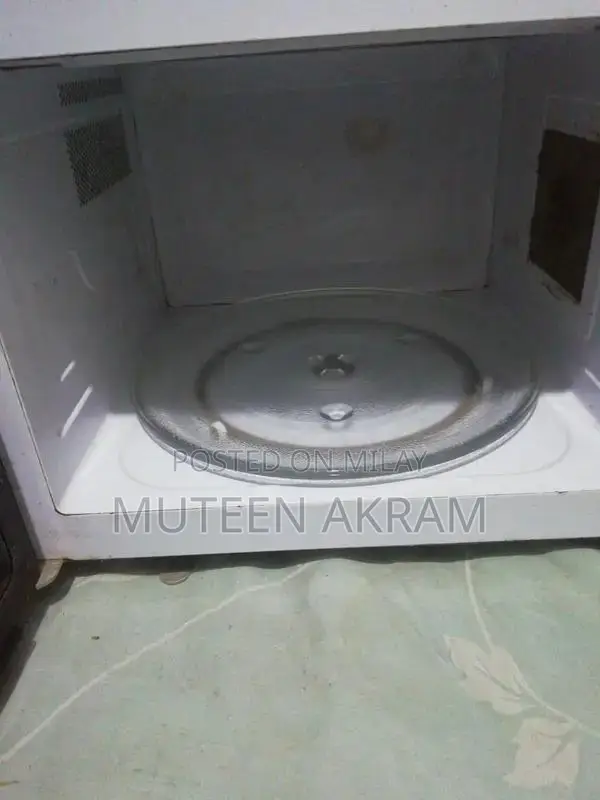 Haier Microwave Oven - Compact Kitchen Appliance