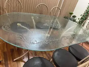 Photo - Solid Iron Dining Table with 8 Matching Chairs