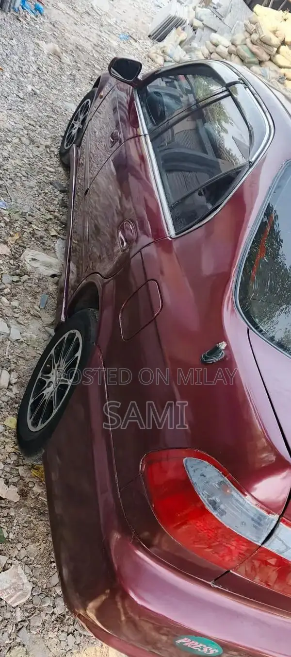 Honda 1999 Sedan - Well-Maintained Import with Sunroof