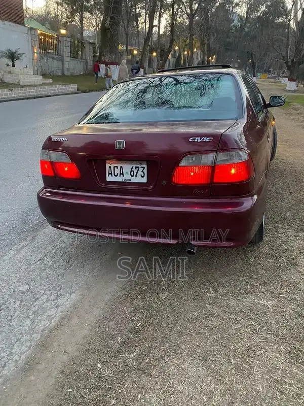 Honda 1999 Sedan - Well-Maintained Import with Sunroof