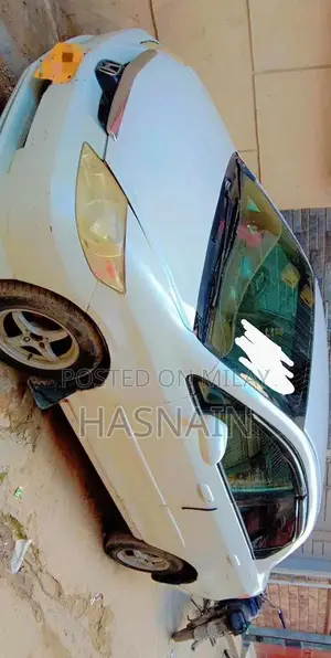 Photo - Honda City 2004 Sedan - Manual Transmission, Well-Maintained Family Ca