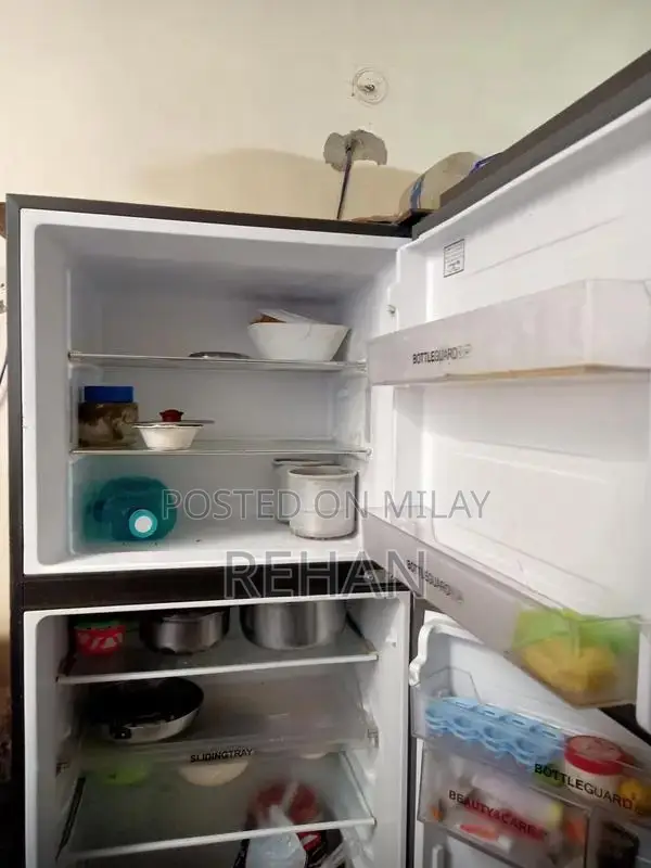 Haier Full-Size Glass Door Refrigerator with Inverter Technology