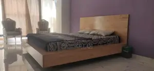 Photo - King Size Bed Frame with Solid Iron Construction