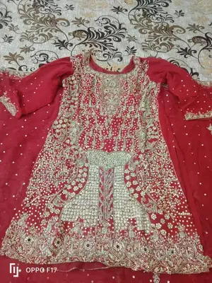 Embellished Red Bridal Lhanga Dress with Matching Pouch