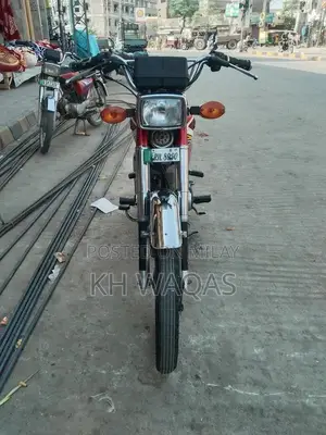 Photo - Honda 125 Motorcycle - Classic Single Cylinder Bike