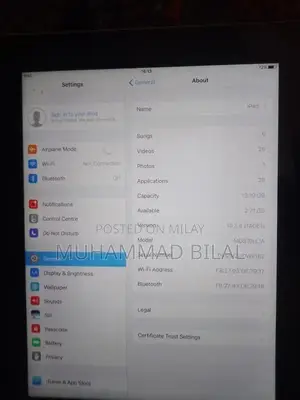 Photo - Apple iPad Tablet - Compact and Functional Touchscreen Device