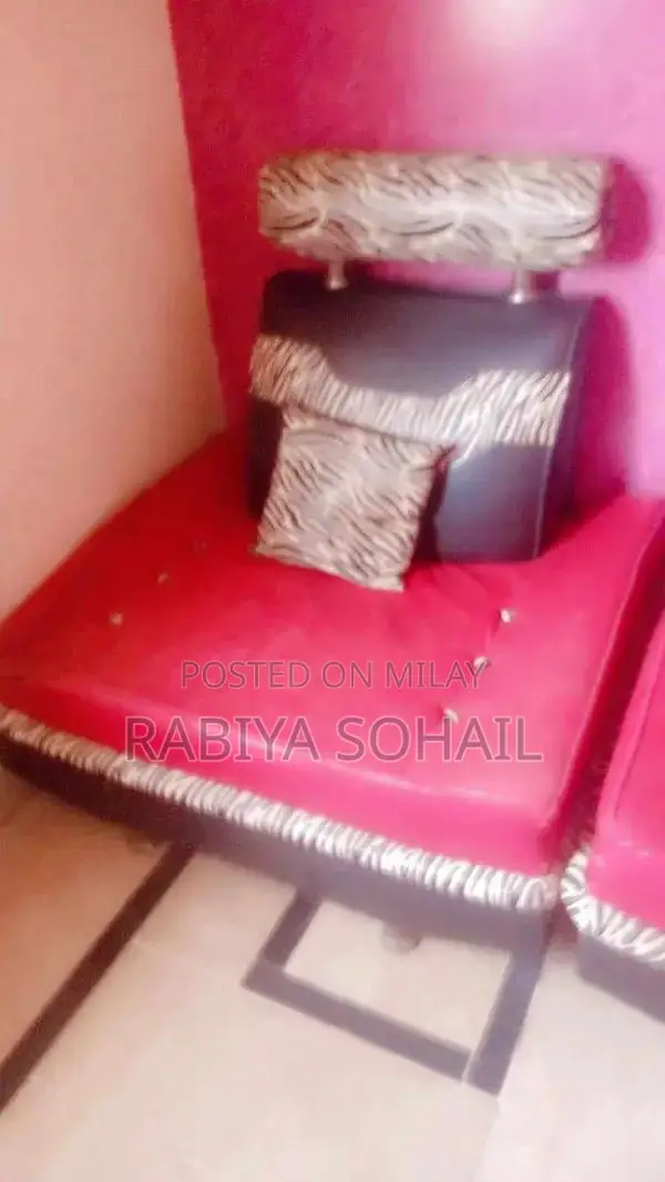 Spacious Seven Seater Sofa Set with Matching Center Table