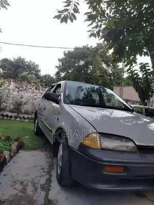 Photo - Suzuki Marglla 1998 Sedan - Well-Maintained Reliable Vehicle