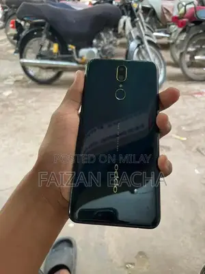 Oppo F11 Blue Smartphone with Clouer Design