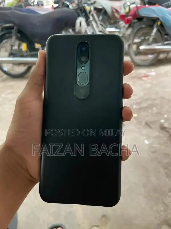 Oppo F11 Blue Smartphone with Clouer Design