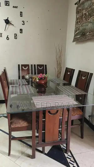 Photo - Wooden Dining Table with 6 Matching Chairs