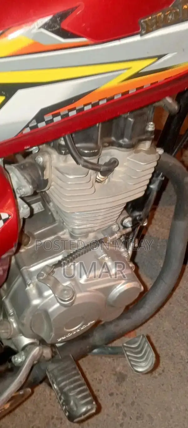 Red Bike with Lohar Number Paper