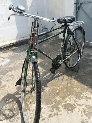 Photo - Medium Size Bicycle with Lock in Good Condition