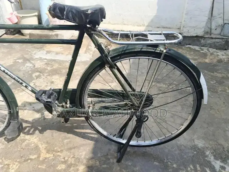 Medium Size Bicycle with Lock in Good Condition