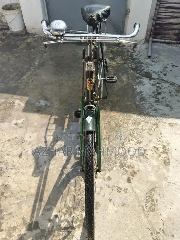 Medium Size Bicycle with Lock in Good Condition