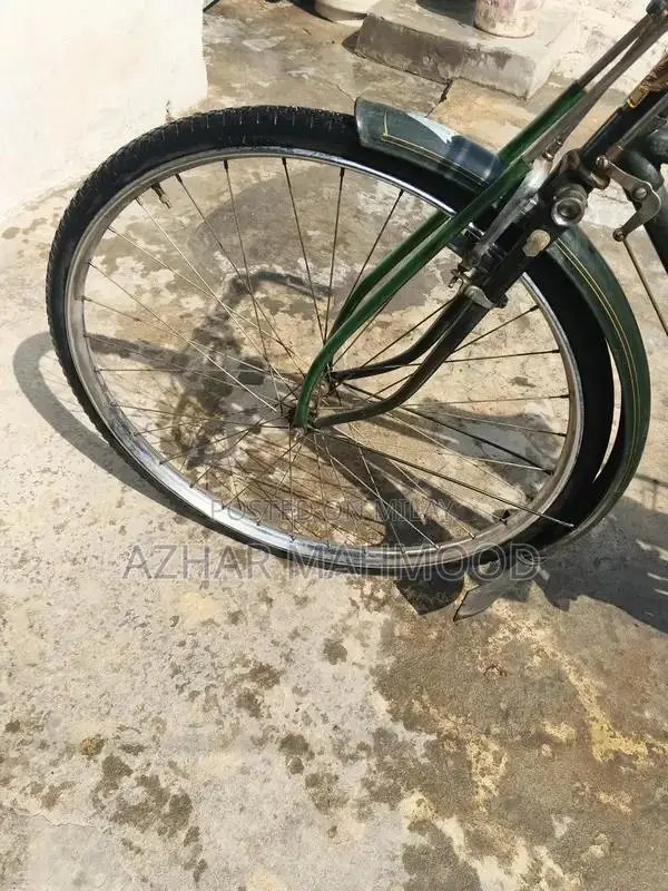 Medium Size Bicycle with Lock in Good Condition