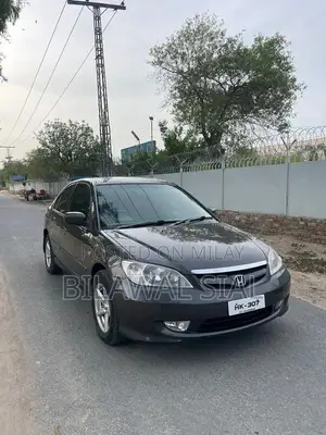 Photo - Honda Civic 2004 Sedan with Sunroof and Engine Update