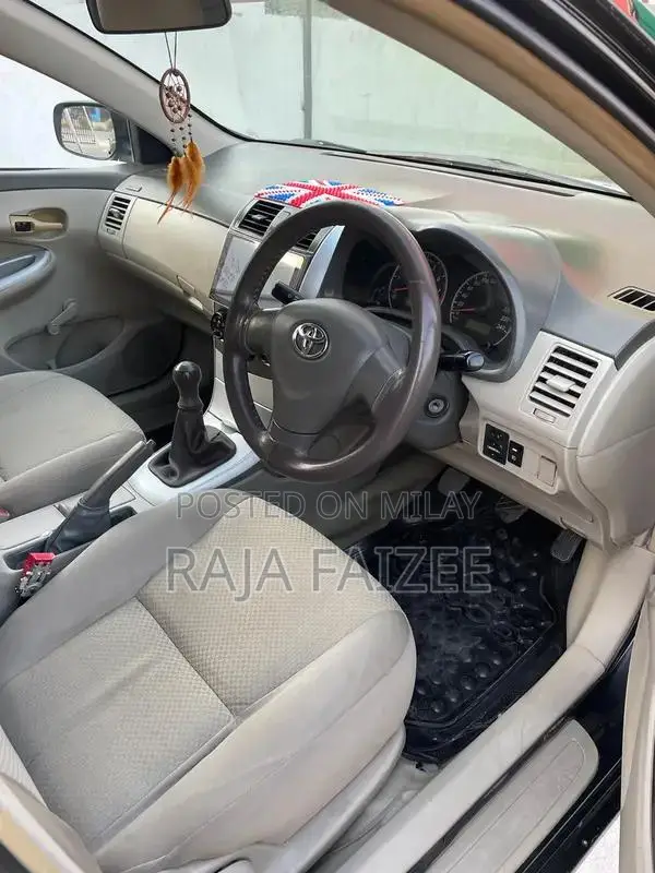 Toyota Corolla XLI Sedan - Reliable Compact Car