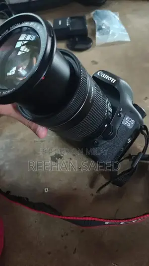 Photo - Canon EOS 7D DSLR Camera with 18-135mm Lens Kit