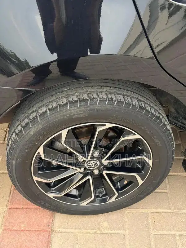 Toyota Grande 1.8 Sedan with Black Exterior and Interior