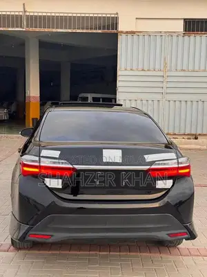 Toyota Grande 1.8 Sedan with Black Exterior and Interior