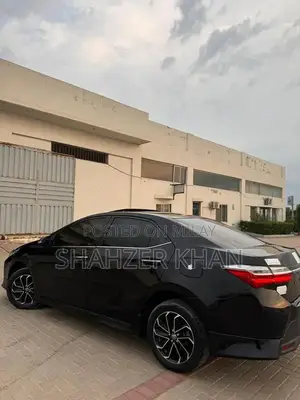 Toyota Grande 1.8 Sedan with Black Exterior and Interior