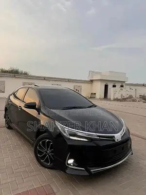 Toyota Grande 1.8 Sedan with Black Exterior and Interior