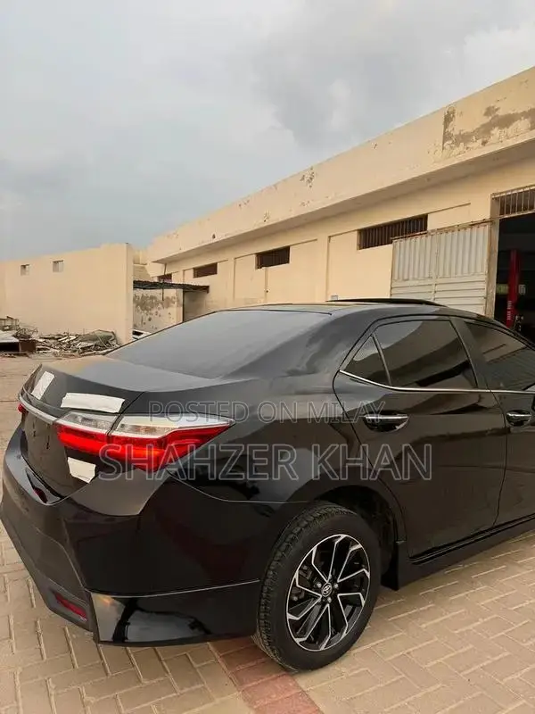 Toyota Grande 1.8 Sedan with Black Exterior and Interior