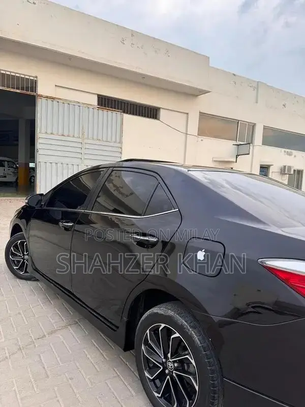 Toyota Grande 1.8 Sedan with Black Exterior and Interior