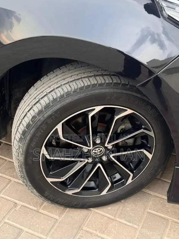 Toyota Grande 1.8 Sedan with Black Exterior and Interior