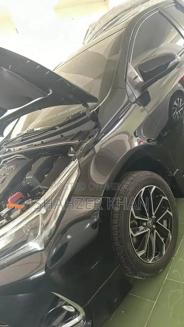 Toyota Grande 1.8 Sedan with Black Exterior and Interior