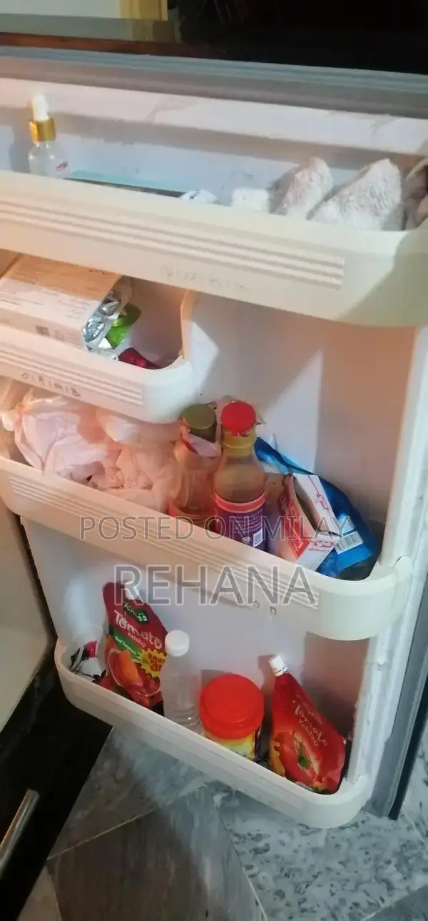 Glass Door Full Size Refrigerator in Good Working Condition