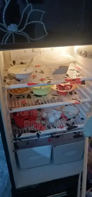 Glass Door Full Size Refrigerator in Good Working Condition