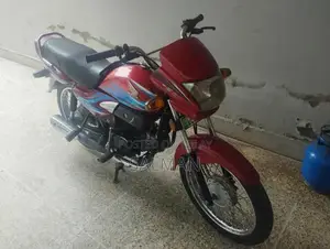 Photo - Honda Pridor 100cc Motorcycle - Reliable City Commuter