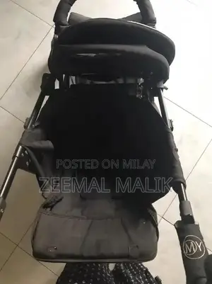 Photo - UK-Made Double-Sided Baby Pram in Excellent Condition