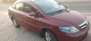 Honda City 2007 Sedan - Well-Maintained Red Compact Car