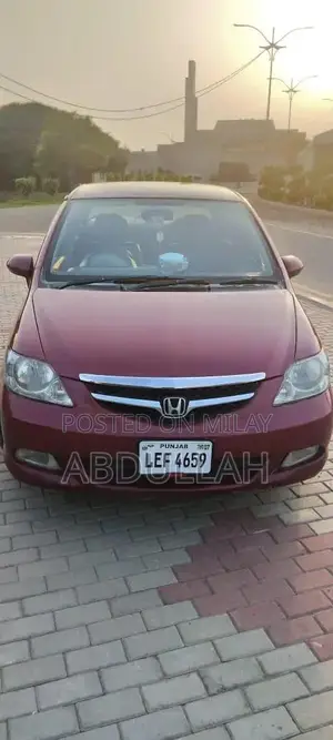 Honda City 2007 Sedan - Well-Maintained Red Compact Car