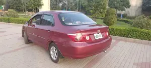 Honda City 2007 Sedan - Well-Maintained Red Compact Car