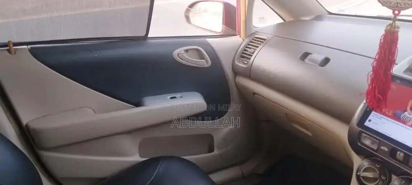 Honda City 2007 Sedan - Well-Maintained Red Compact Car