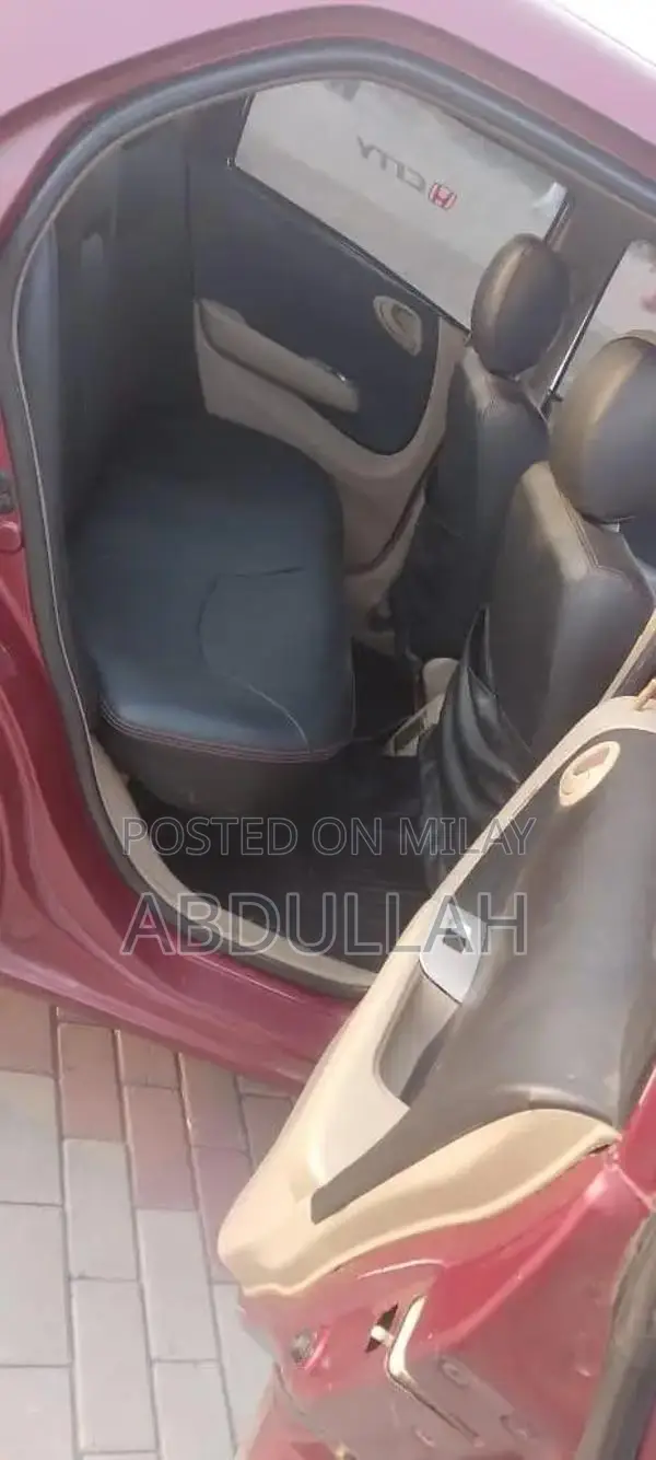 Honda City 2007 Sedan - Well-Maintained Red Compact Car