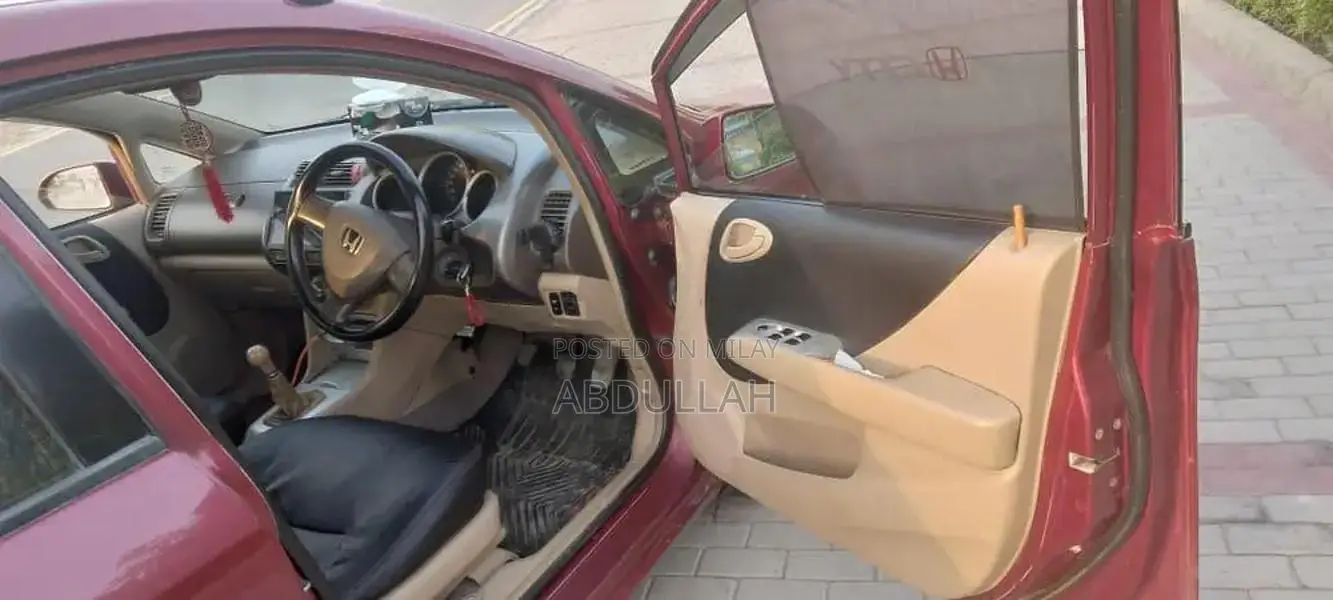 Honda City 2007 Sedan - Well-Maintained Red Compact Car